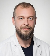 Врач Романенко Евгений Эдуардович
